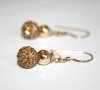 Gold Swarovski crystal bead fishhook earrings with gold bead accents.