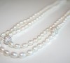 White freshwater pearl necklace set with sparkly Swarovski bead accents